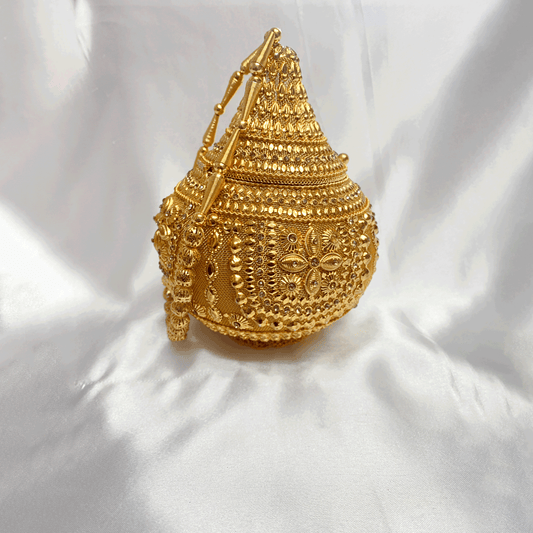 luxurious gold plated bridal bag that will make your bridal look complete on your big day.