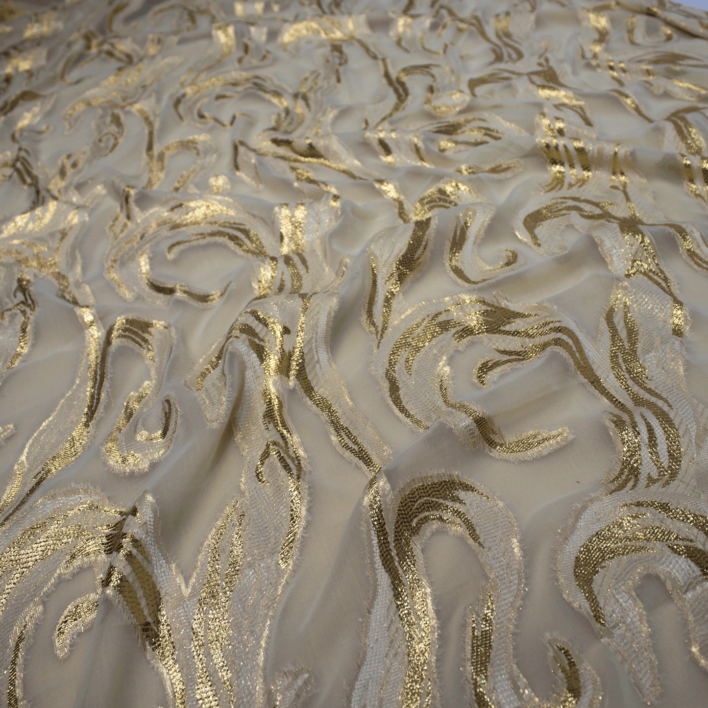 beautiful Ivory gold Dirac fransawi, made from fine fabric with intricate floral design patterns.